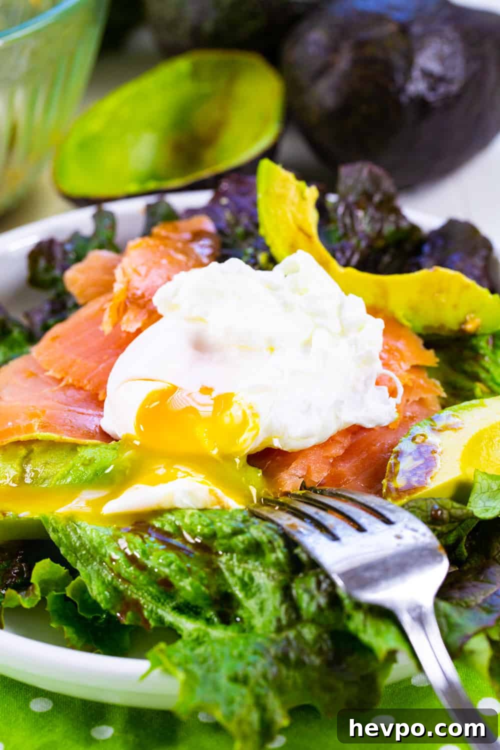 Smoked Salmon and Avocado Salad with a poached egg on top.