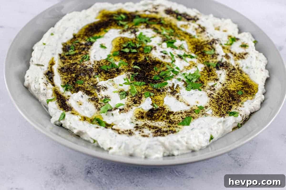 Top 10 Most Popular Recipes of 2022 You Need to Try 10 A plate of Haydari yoghurt dip, drizzled with olive oil and dried mint with a large copper spoon sit on a marble tabletop