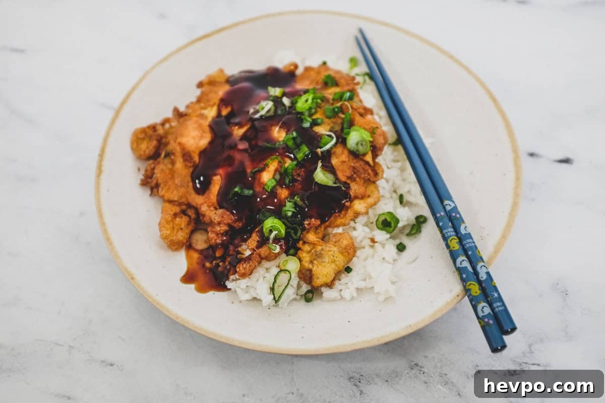 Top 10 Most Popular Recipes of 2022 You Need to Try 2 Crispy Chinese omelette patties with chicken, beansprouts and rich gravy