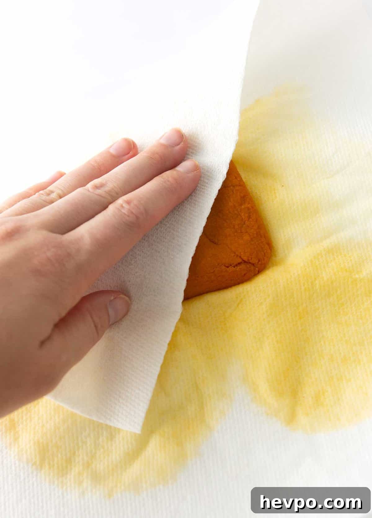 Soft Chewy Pumpkin Snickerdoodle Cookies 5 blotting water out of pumpkin puree with paper towel