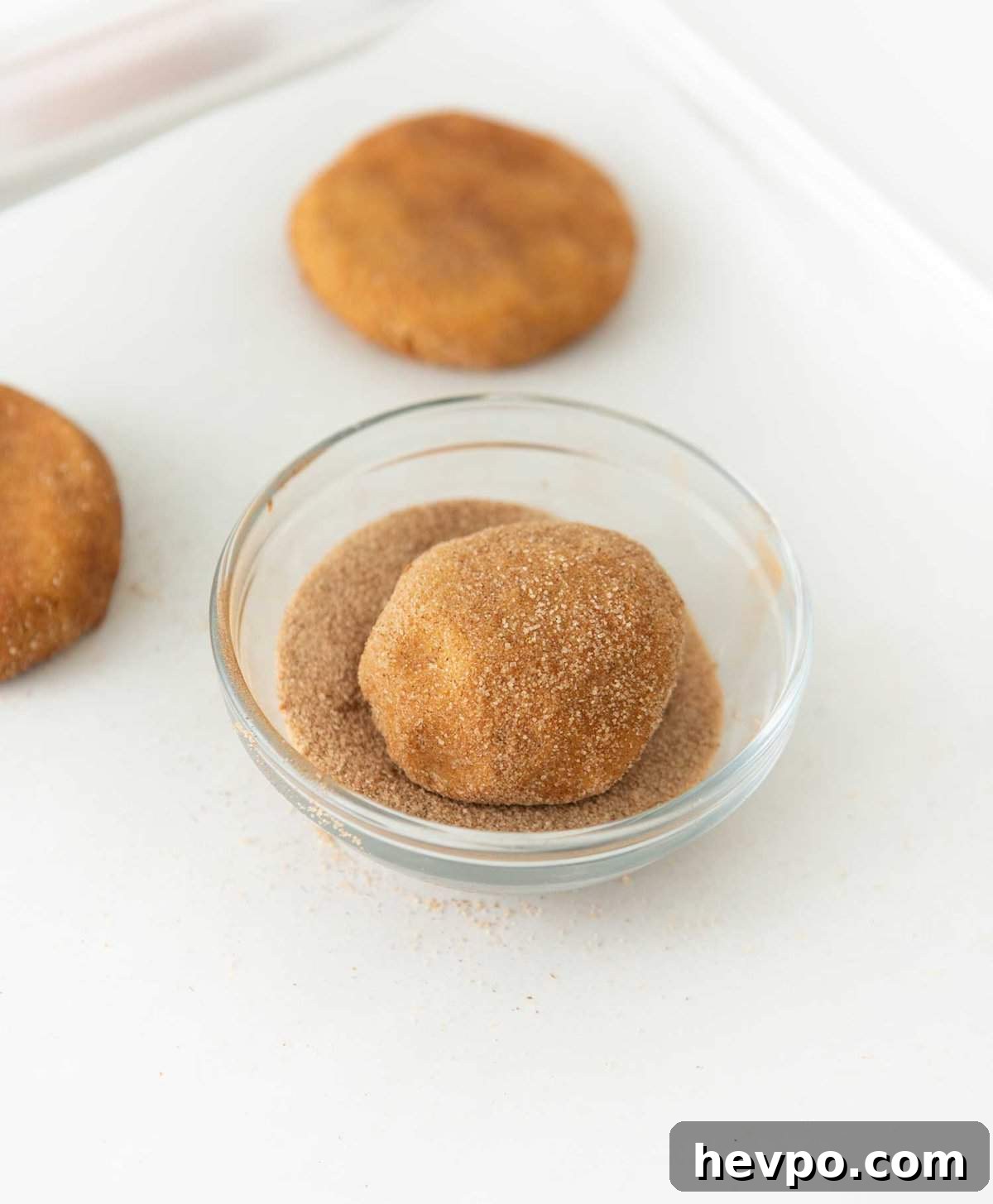 Soft Chewy Pumpkin Snickerdoodle Cookies 8 roll pumpkin snickerdoodle balls in cinnamon sugar