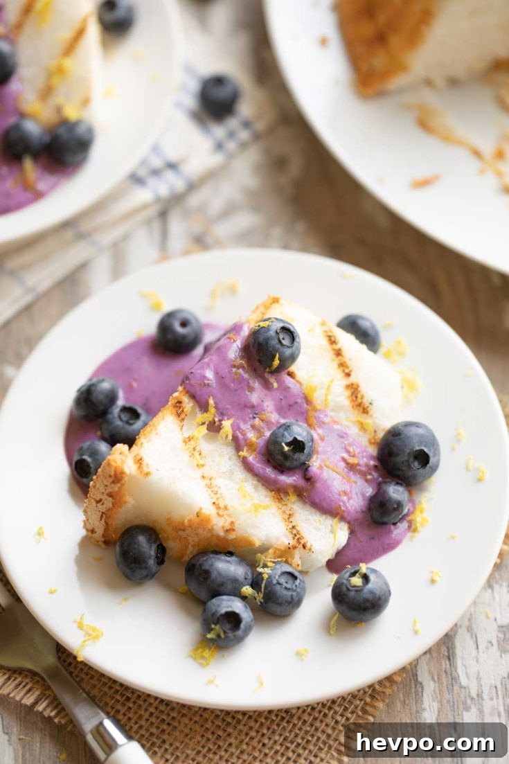 One plate of angel food cake with berries and cream