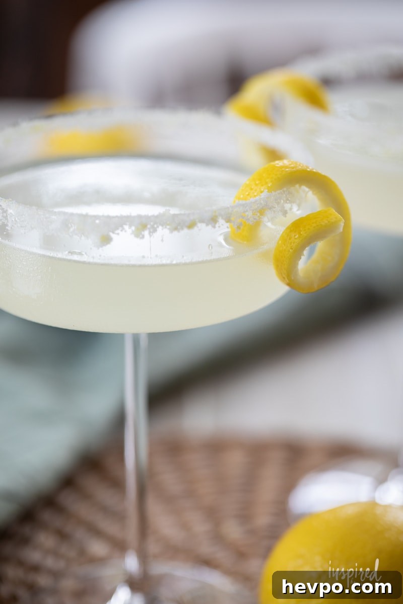 Zesty Lemon Drop Martini Recipe: How to Make the Classic Cocktail 3 Lemon Drop Martini in martini glass.