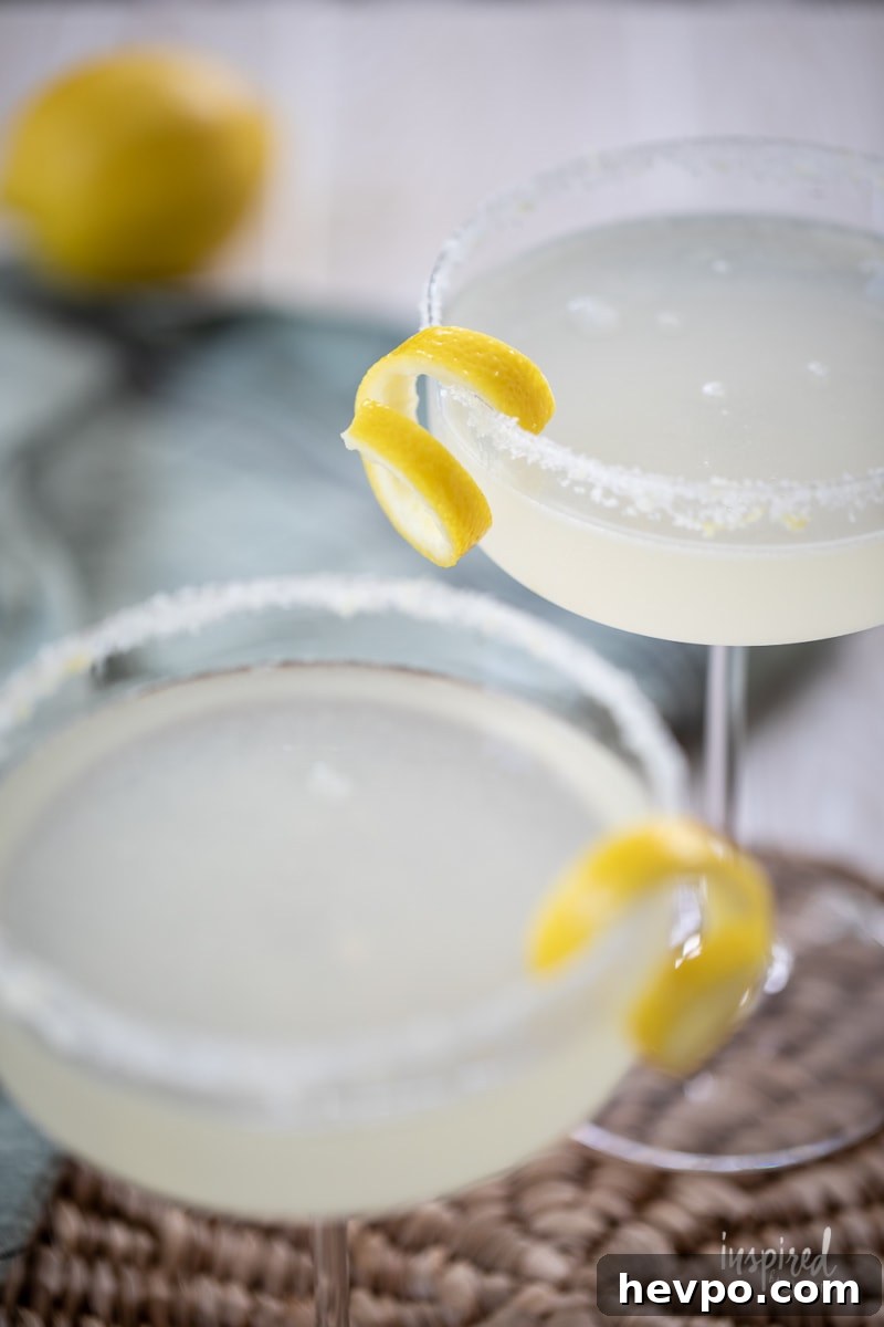 Zesty Lemon Drop Martini Recipe: How to Make the Classic Cocktail 4 Lemon Drop Martini in martini glass.