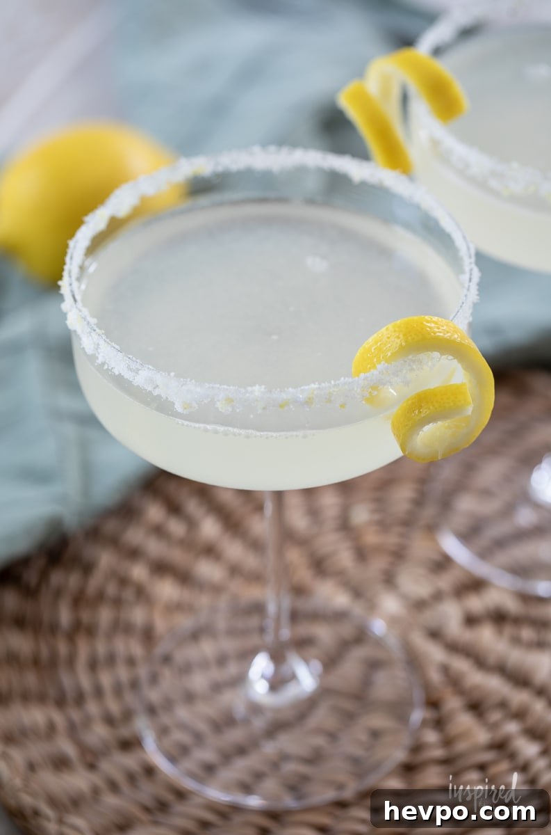 Zesty Lemon Drop Martini Recipe: How to Make the Classic Cocktail 9 Lemon Drop Martini in martini glass.