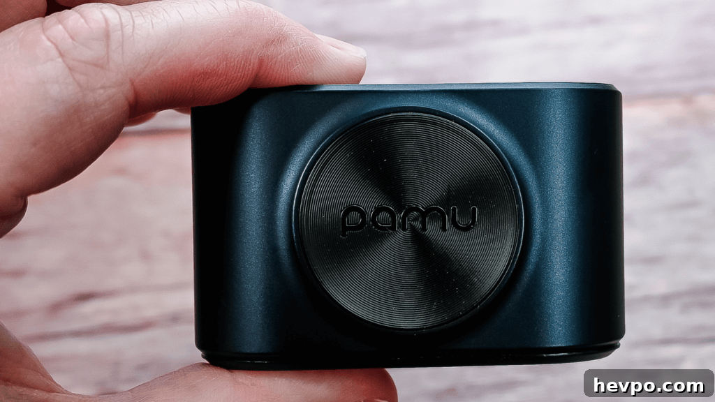 fingers holding the case for the PaMu Slide 2 ANC Wireless Earbuds