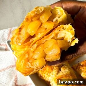 Classic Apple Hand Pies Made with Flaky Puff Pastry 12 Golden brown puff pastry apple hand pies with flakey layers and spiced apple filling.