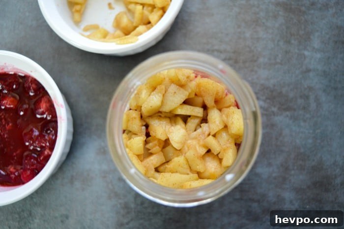 Cranberry Apple Parfait Recipe with Yogurt and Granola 4 view of the cinnamon apples in the jar