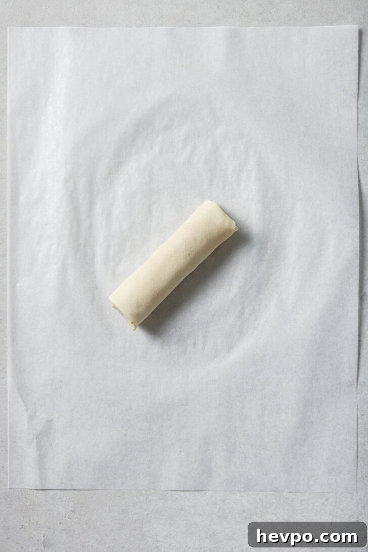 Chicken Spring Roll rolled and ready to be fried.