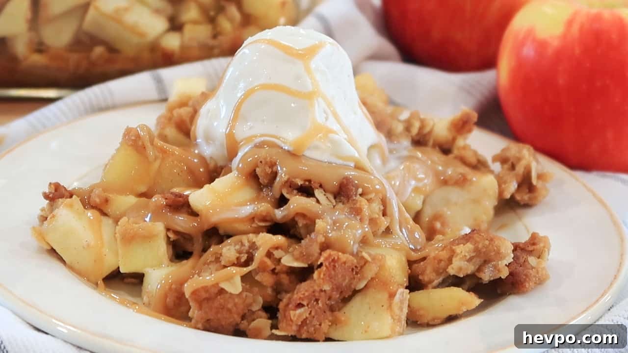 Caramel Apple Crisp with Crunchy Oat Topping Recipe 5 warm apple crisp with vanilla ice cream on top.