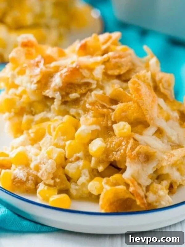 baked scalloped corn with crispy cornflakes on a plate on a table