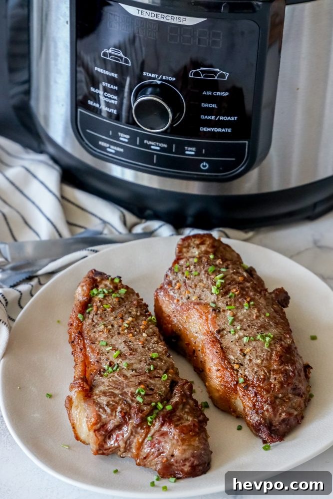 picture of steaks in front of instant pot