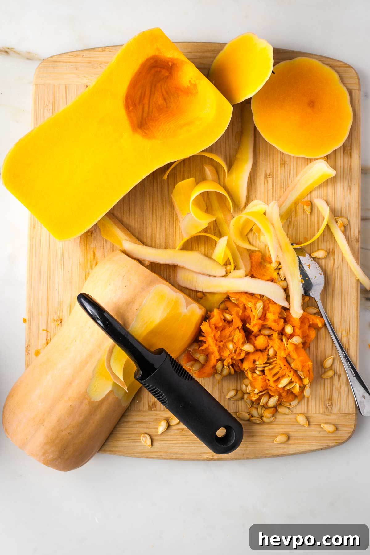 Autumn Vegan Minestrone: Hearty Fall Vegetable Soup 4 Butternut squash, halved, seeds scooped out, vegetable peeler removing skin.