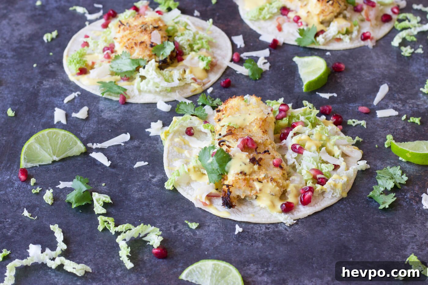 Crispy Fish Tacos with Pomegranate, Pear & Honey-Lime Crema 5 Crazy for tacos? Add these Crispy Fish Tacos to your menu! Crispy baked cod topped with pomegranates, shredded pear, and Honey Lime Crema. Simple to make at home!