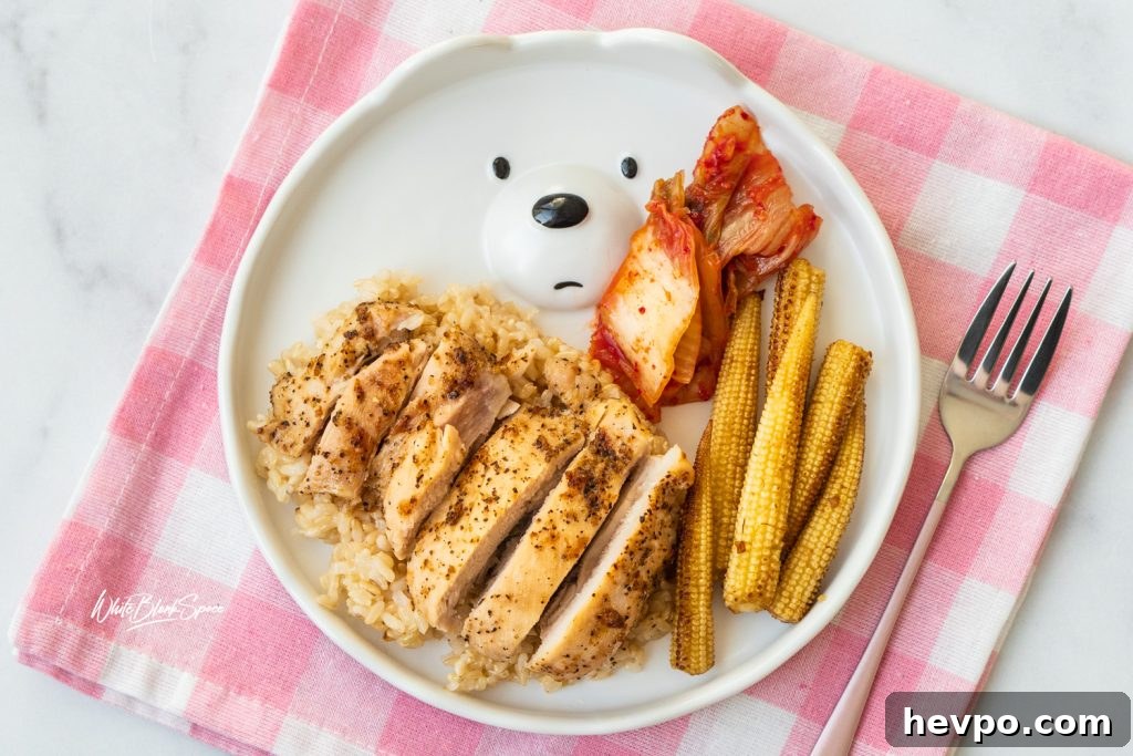 lemon pepper chicken thighs served with kimchi and baby corns