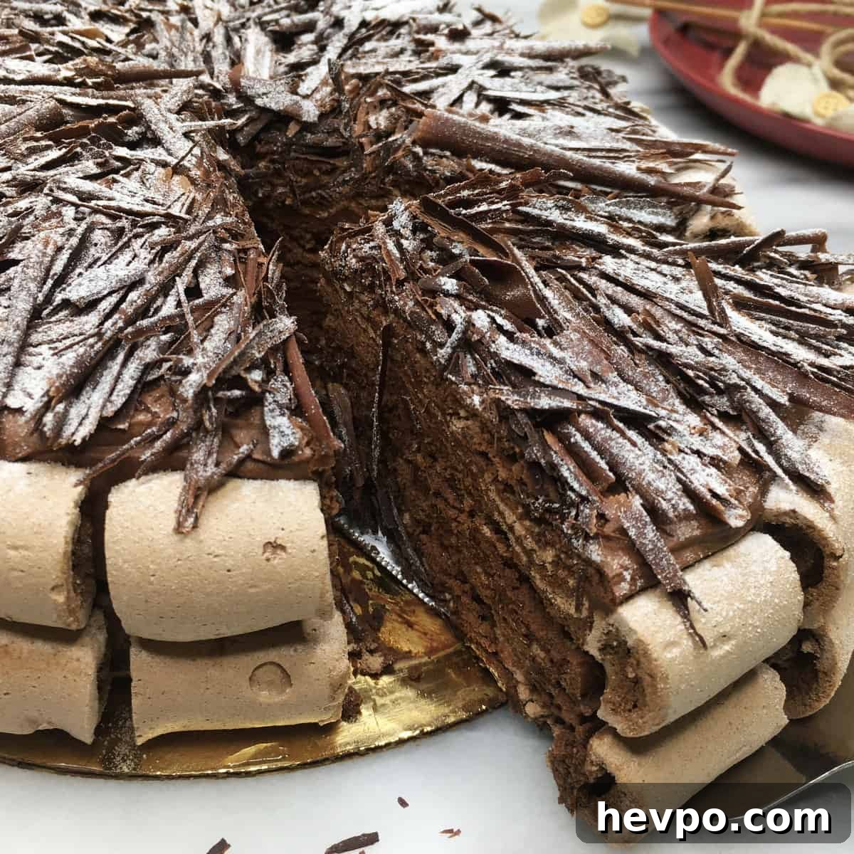 Sliced chocolate meringue cake Concorde on a cake board