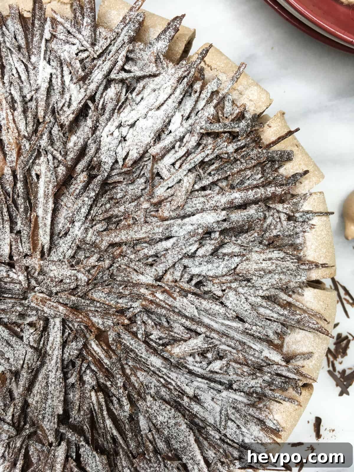 Chocolate meringue cake on a marble board: Overhead view
