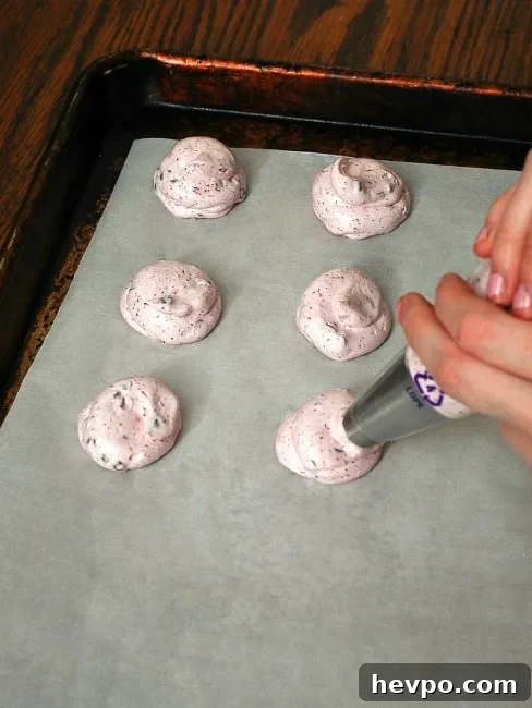 Cherry Chocolate Chip Meringue Cookies | theredheadbaker.com