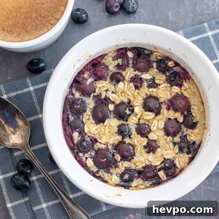 Single-Serve Baked Oats Recipe for One: Quick Breakfast Bowl 7 baked oats for one in a bowl with blueberries