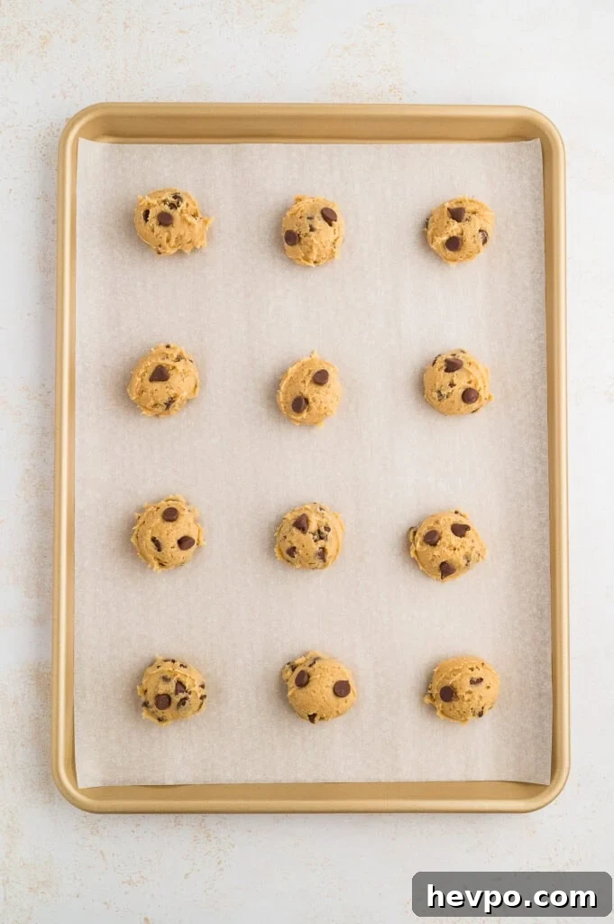 Gluten-Free Chocolate Chip Cookies Loved by Non-GF Eaters 10 Gluten free chocolate chip cookies on a baking sheet.