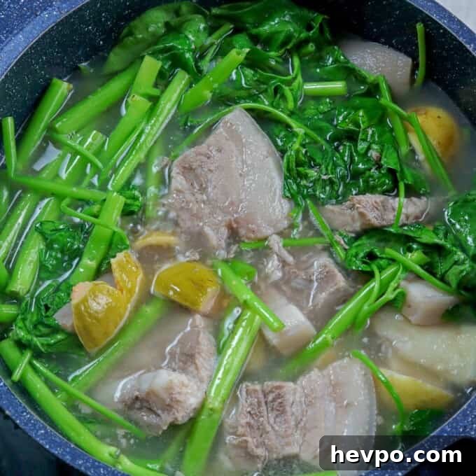 Bulanglang Pork Stew: Filipino Spiced Pork in Sour Broth 7 Pork Bulanglang in a pot