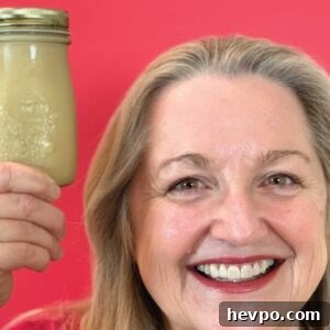 Homemade Condensed Milk: Simple Recipe for Creamy Results 2 Mary holding a bottle of condensed milk.