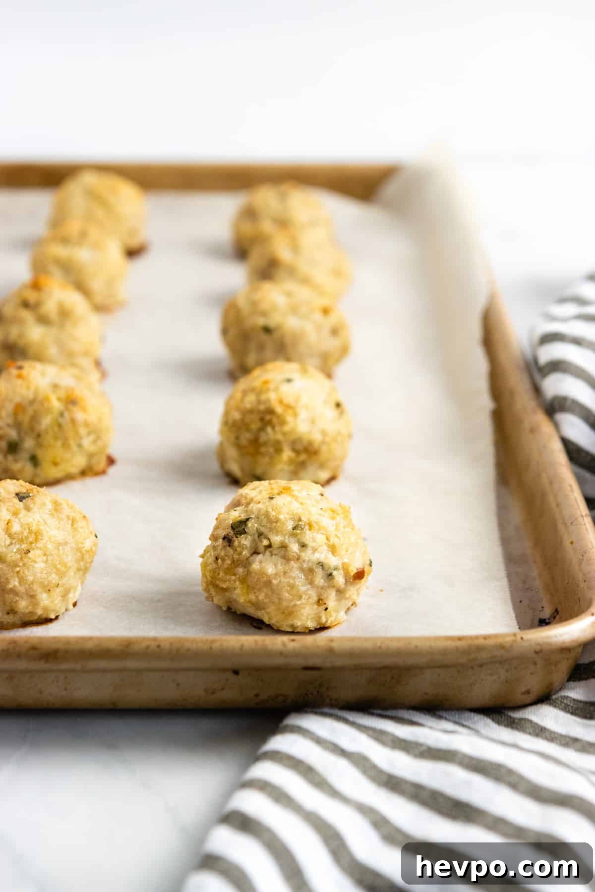 Chicken meatballs cooked on sheet pan.