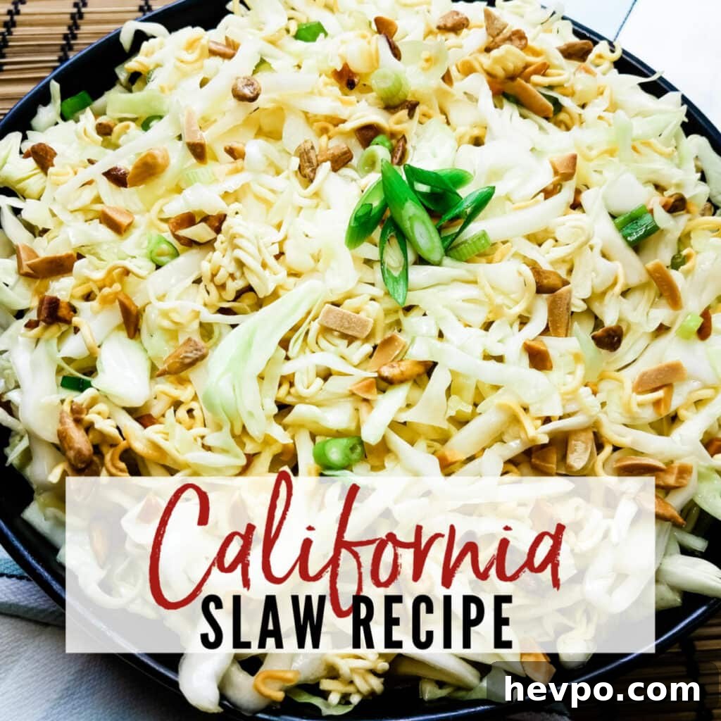 Close up view of bowl of California Slaw Recipe with cabbage, ramen noodles, almonds & green onions | A Reinvented Mom