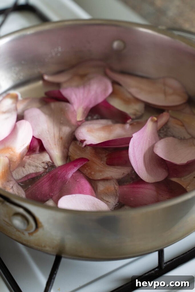 Magnolia Flower Syrup Recipe & Uses for Flavor and Wellness 5 Making simple syrup with fresh flowers