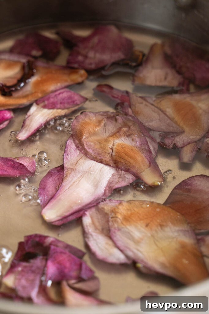 Magnolia Flower Syrup Recipe & Uses for Flavor and Wellness 6 Magnolia petals simmering in syrup