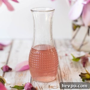 Magnolia Flower Syrup Recipe & Uses for Flavor and Wellness 9 A glass full of magnolia flower syrup