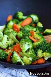 Simple Vegan Quinoa Fried Rice - Broccoli Mxied with Carrots in a Pan