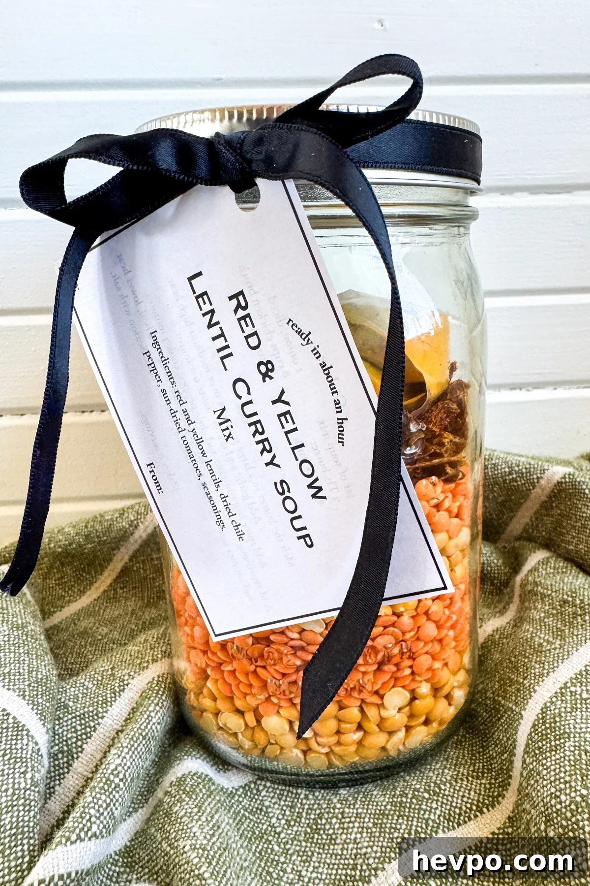 lentil curry soup in a jar with tag and bow