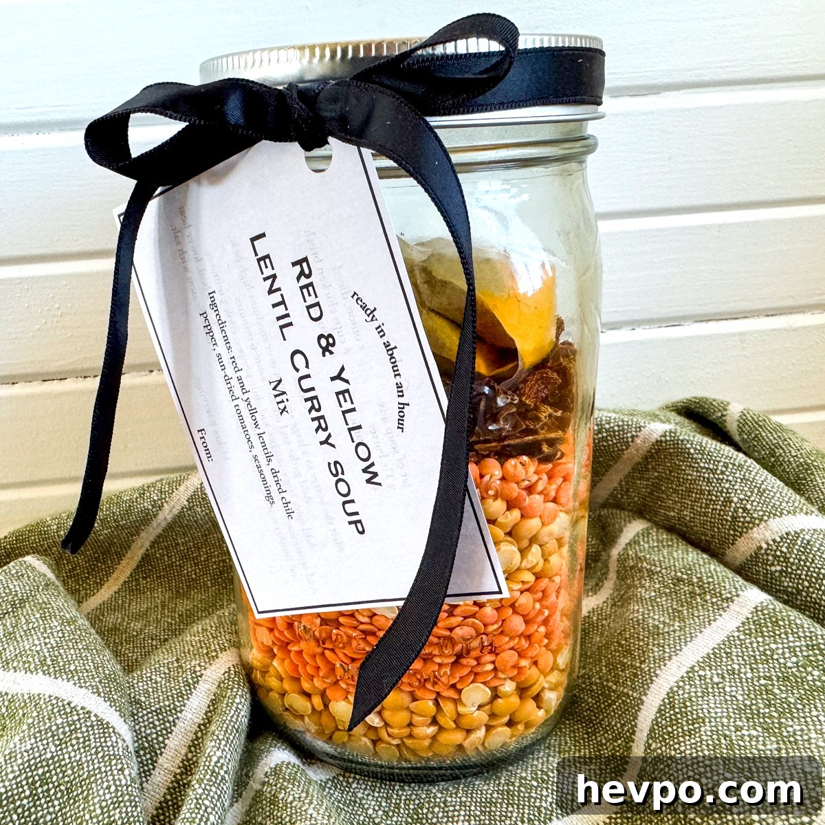 lentil curry soup in a jar with label and ribbon