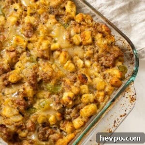Italian sausage stuffing baked in a glass baking pan.