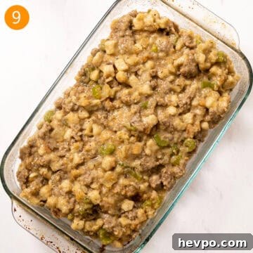 Sauteed stuffing in a glass baking pan to bake in the oven.
