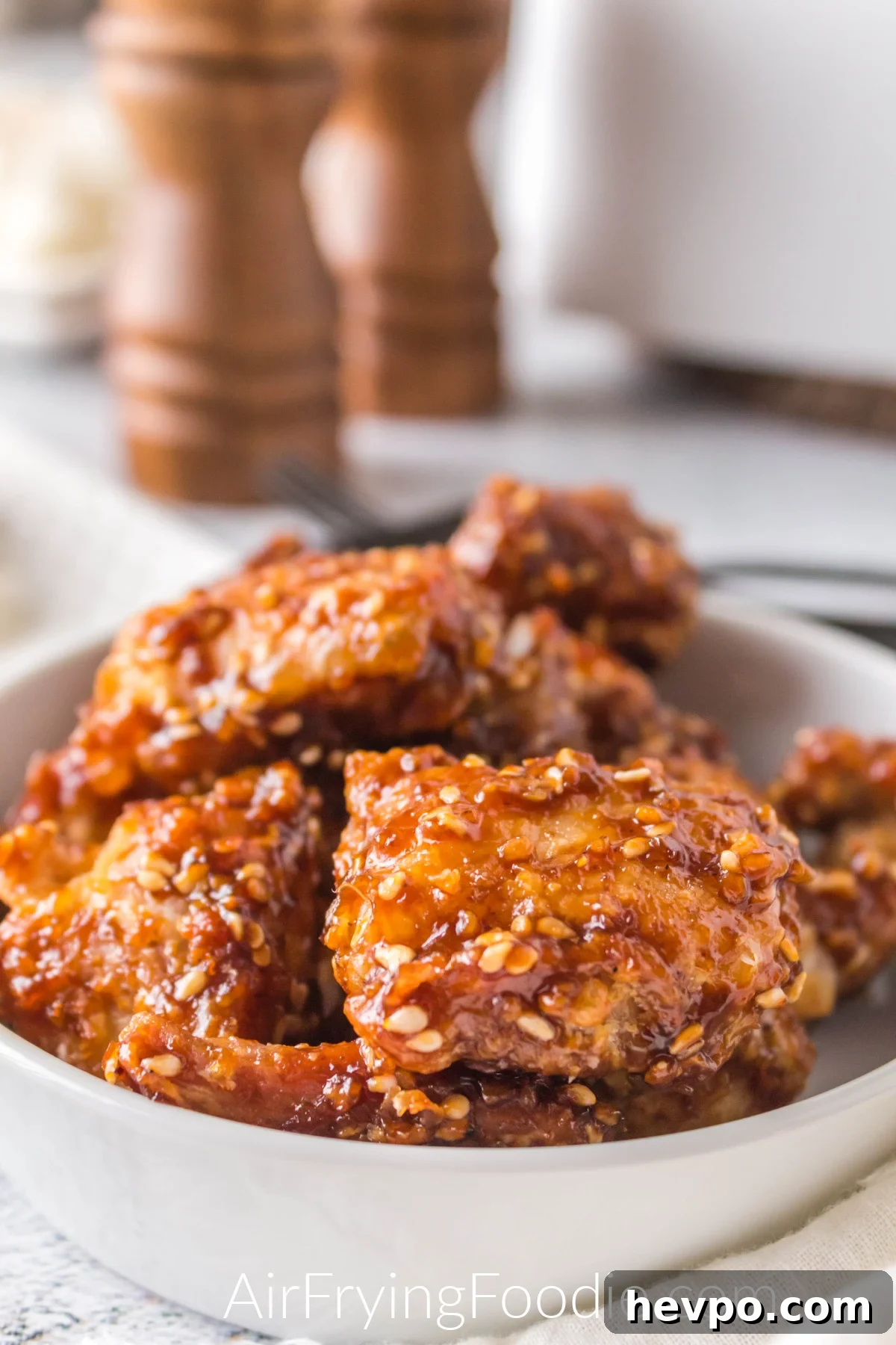 Air Fryer Sesame chicken in a bowl ready to serve.