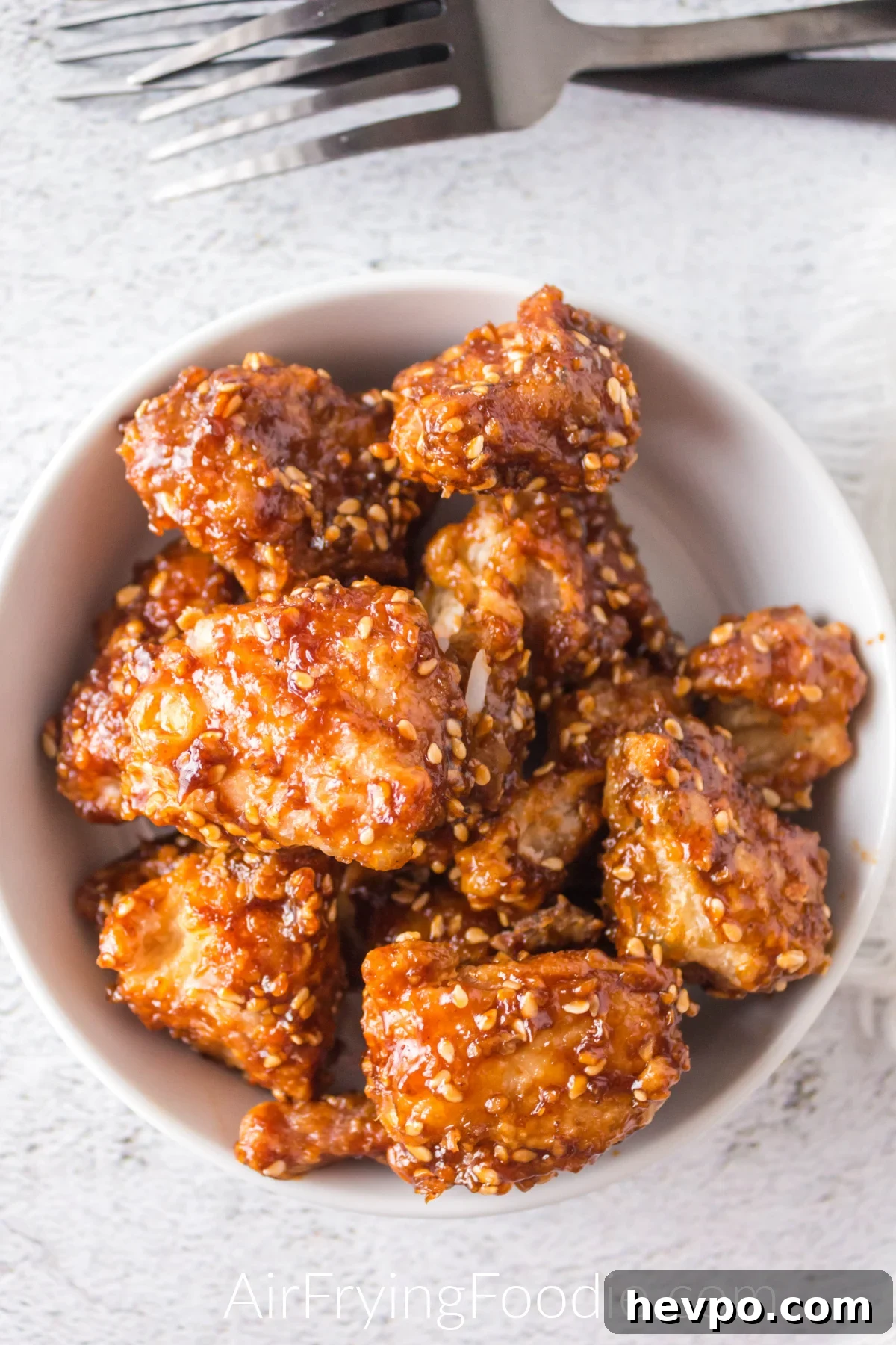 Air fryer sesame chicken in a bowl ready to serve.