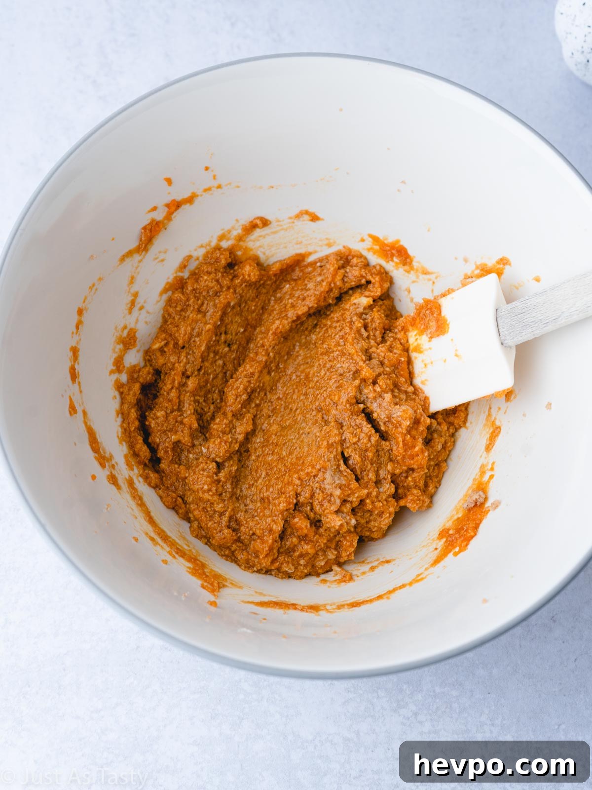 Gluten-Free Pumpkin Bars Recipe for Moist Spiced Squares 5 Wet ingredients in a bowl.