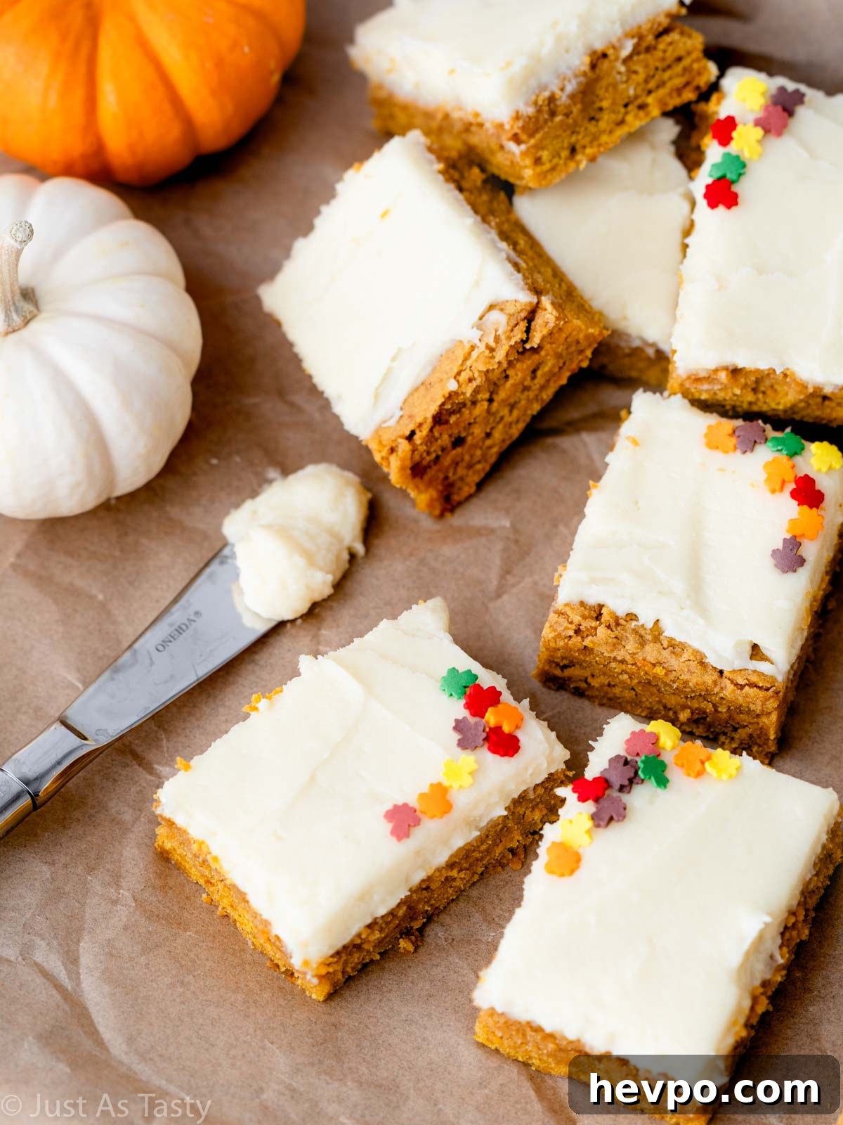 Gluten-Free Pumpkin Bars Recipe for Moist Spiced Squares 7 Close-up of frosted pumpkin bars.