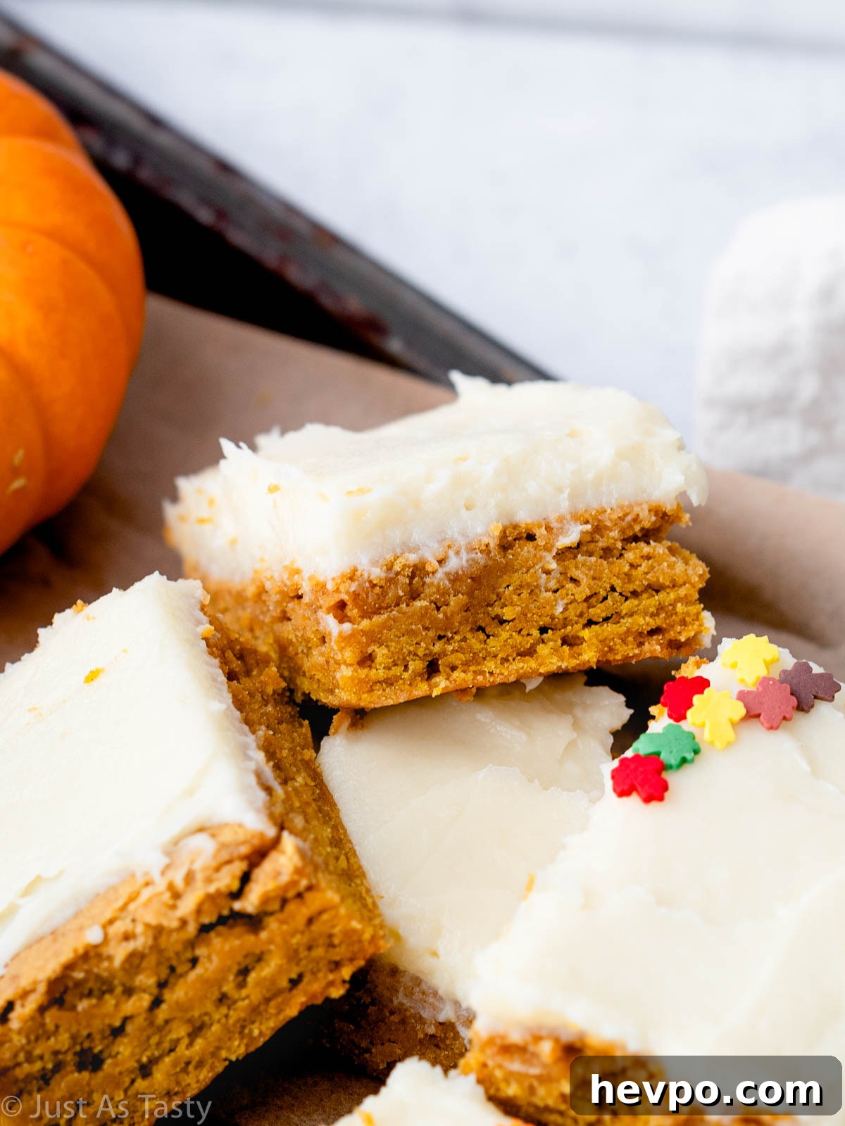 Gluten-Free Pumpkin Bars Recipe for Moist Spiced Squares 8 Close-up of gluten free pumpkin bars with cream cheese frosting.