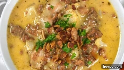 bowl of keto cheeseburger soup topped with bacon