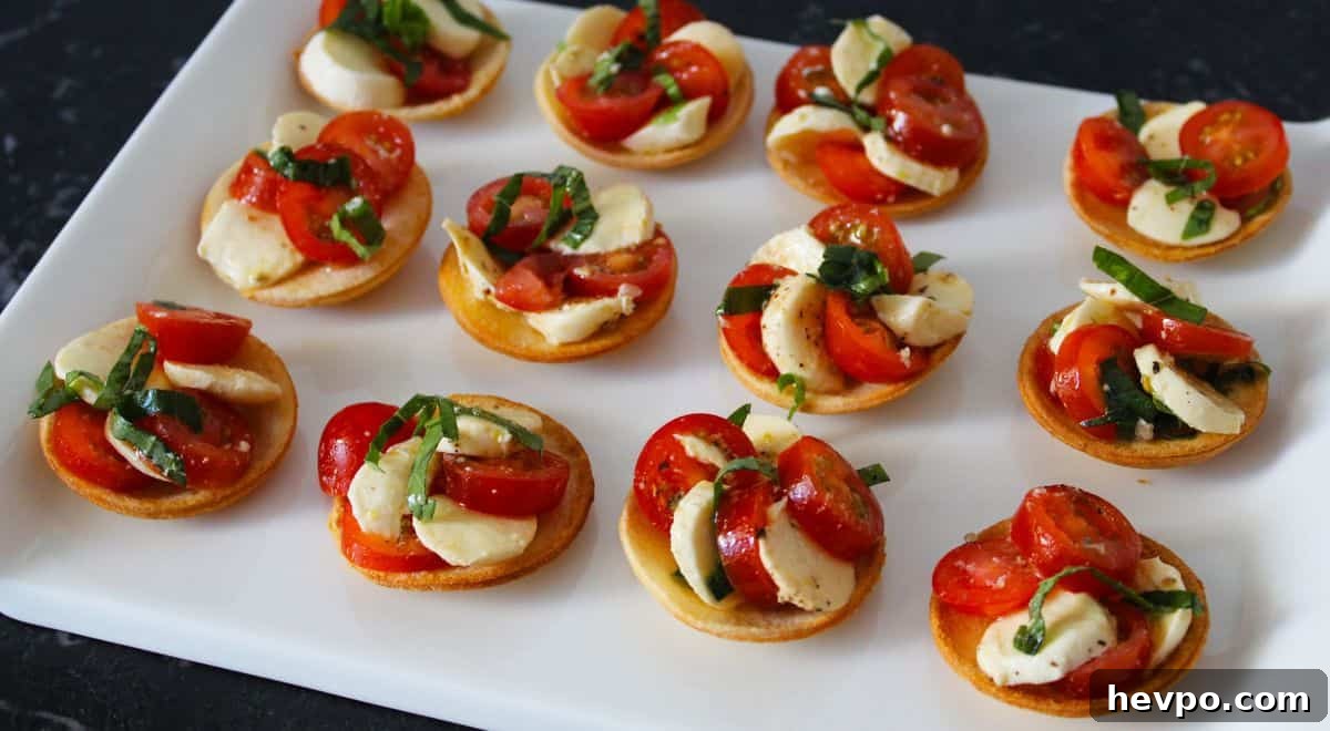 Tartlets on a white platter. 