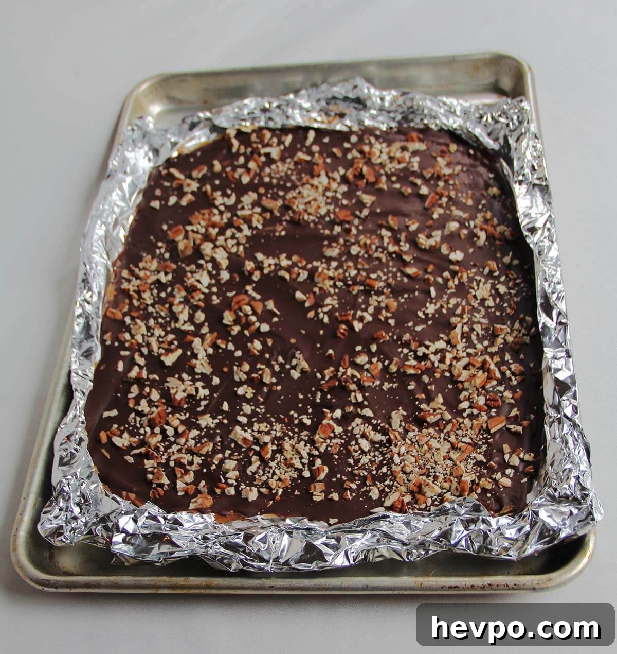 Classic Butter Toffee Recipe: Crispy Homemade Candy Guide 7 Pan with foil shell with butter toffee.