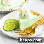 Margarita Pie Recipe: Zesty Lime and Tequila Tart 5 slice of margarita pie on a plate in front of the pie in the pie dish