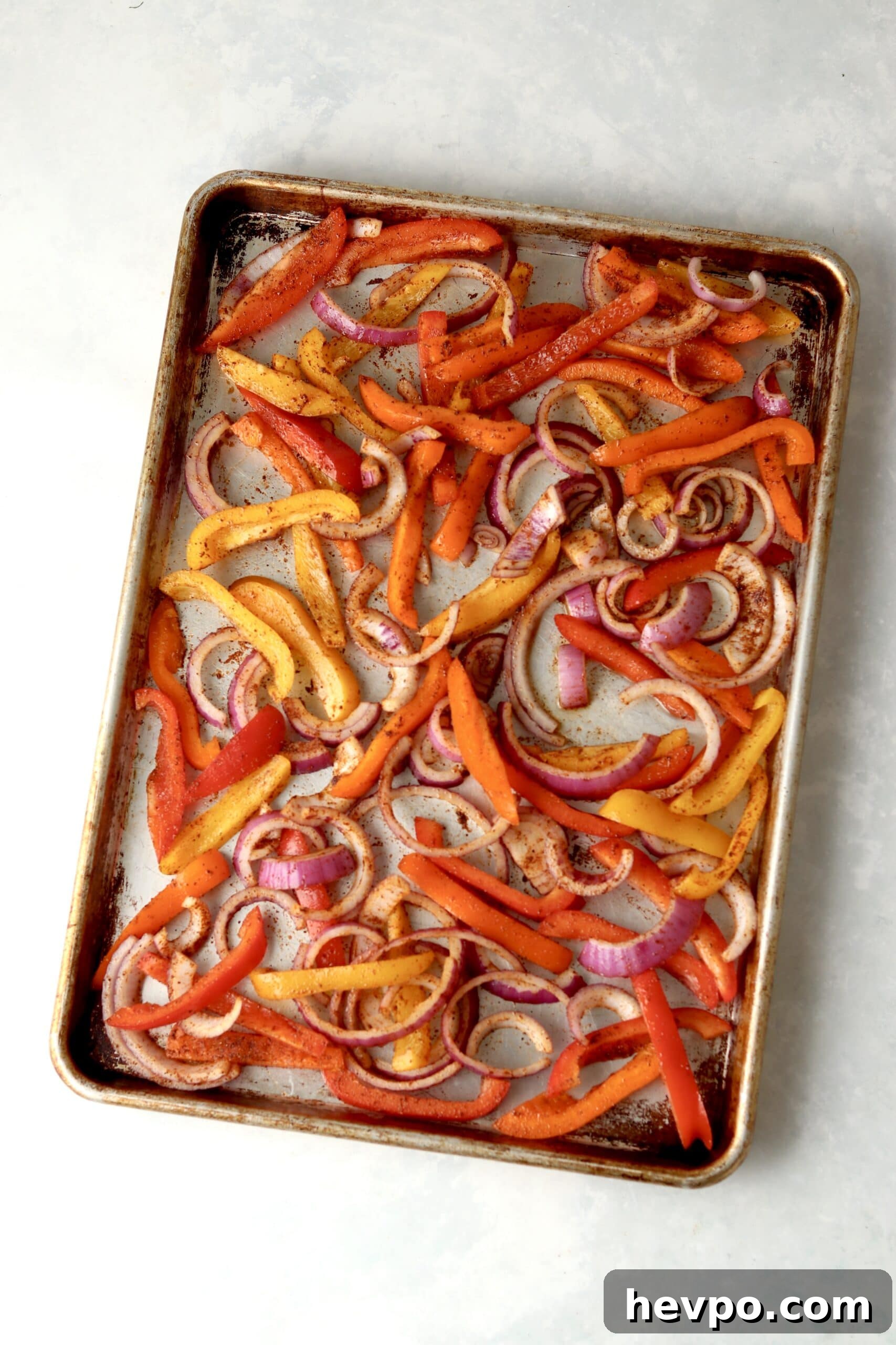 Sheet Pan Shrimp Fajitas with Peppers and Lime Butter 3 peppers and onions on sheet pan