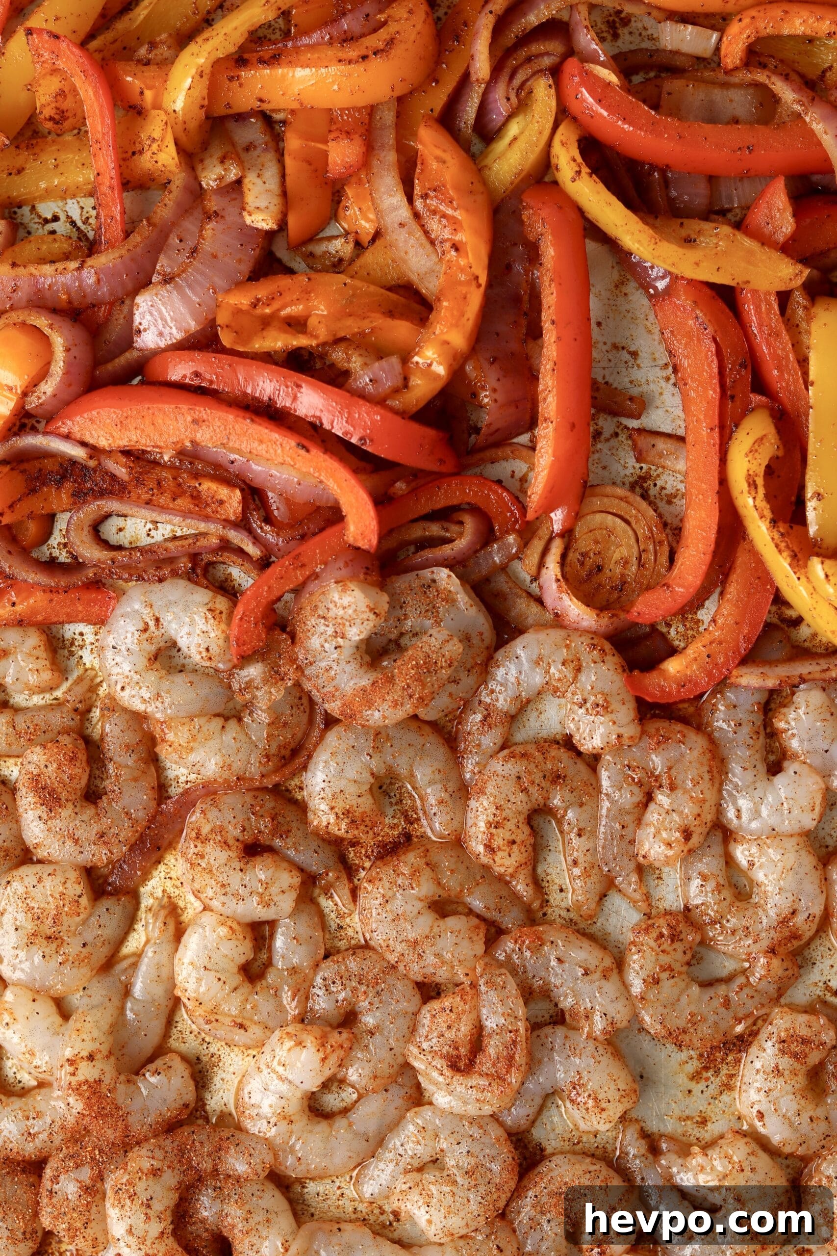 Sheet Pan Shrimp Fajitas with Peppers and Lime Butter 6 raw shrimp and peppers in spices