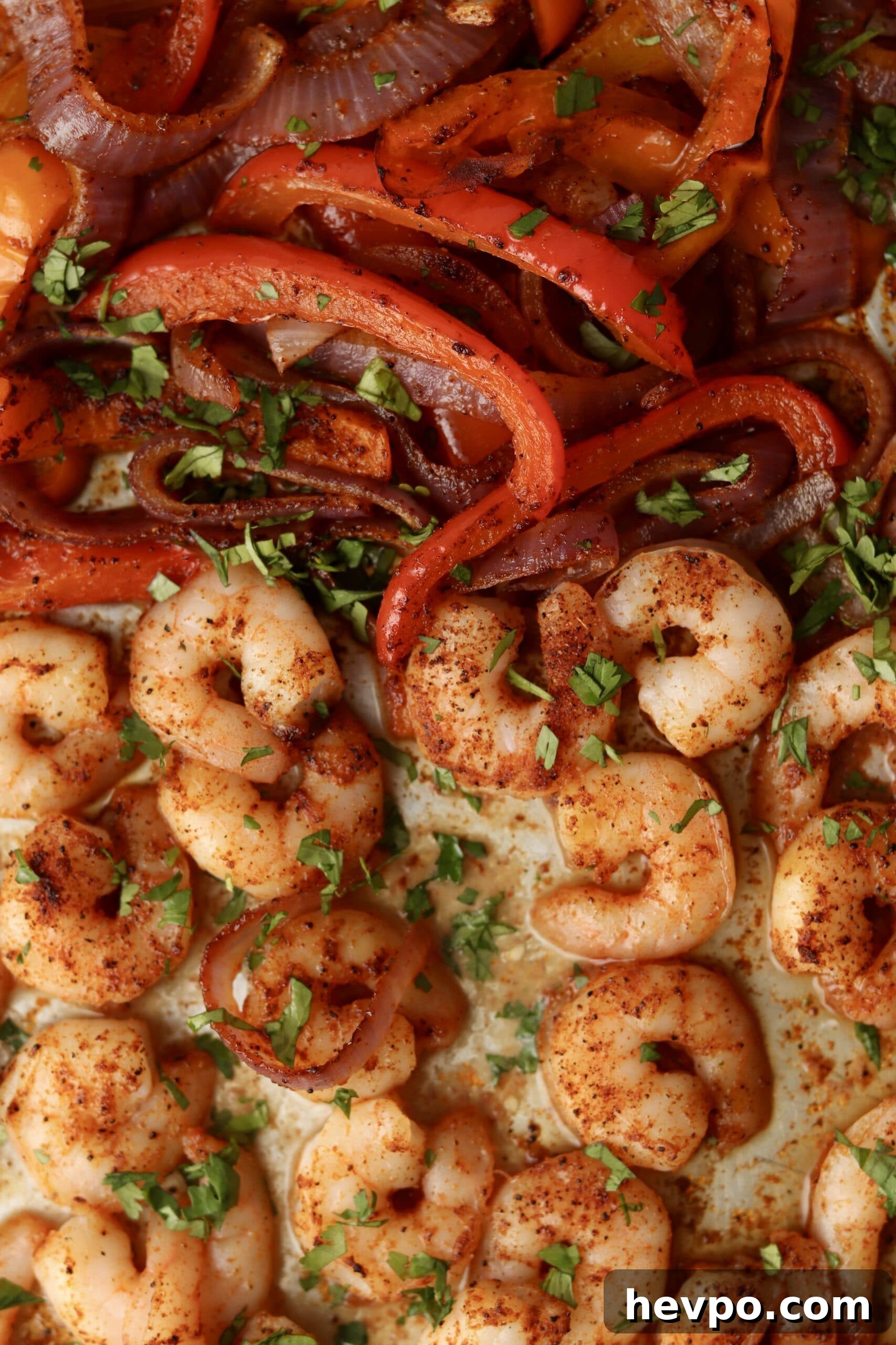Sheet Pan Shrimp Fajitas with Peppers and Lime Butter 7 cooked shrimp and peppers in spices