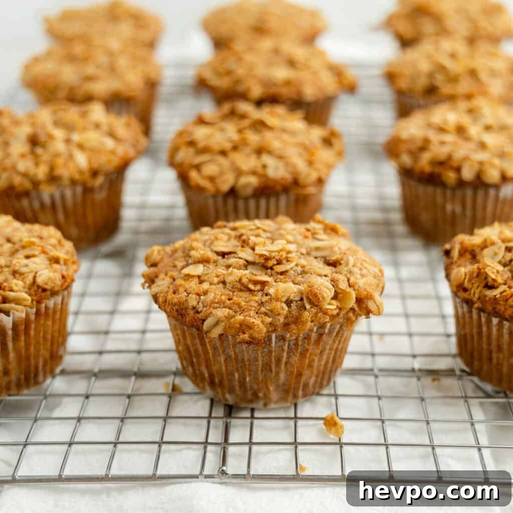 Maple Bacon Recipe with Just 2 Ingredients 13 Carrot Apple Muffins on a wire rack.