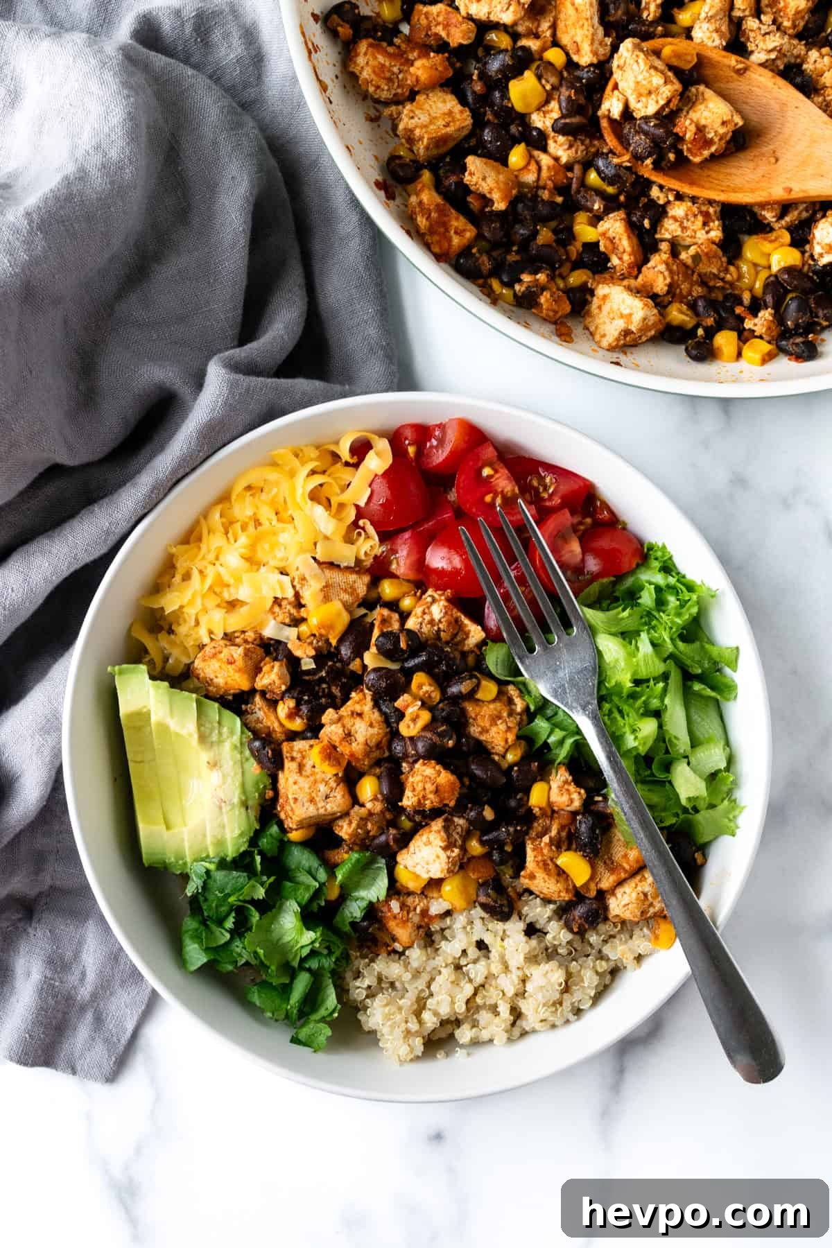 Tofu Burrito Bowl with a fork.